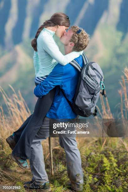 coupe kissing on a hike - walker island campground stock pictures, royalty-free photos & images
