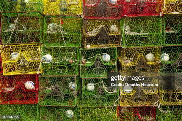 stacks of colorful lobster/crab traps - matlacha stock pictures, royalty-free photos & images