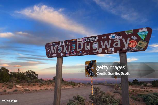 sign of moki dugway on highway 216, utah - moki stock pictures, royalty-free photos & images