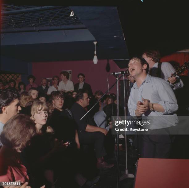 Lead singer Eric Burdon performing with The Animals, circa 1965.