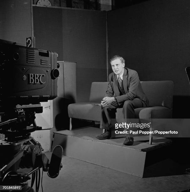 English broadcaster and naturalist David Attenborough at work in a BBC TV studio, 3rd March 1956.