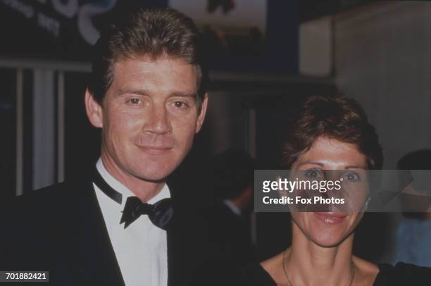 English actor Anthony Andrews and his wife Georgina at the London premiere of 'Superman IV: The Quest for Peace', 23rd July 1987.