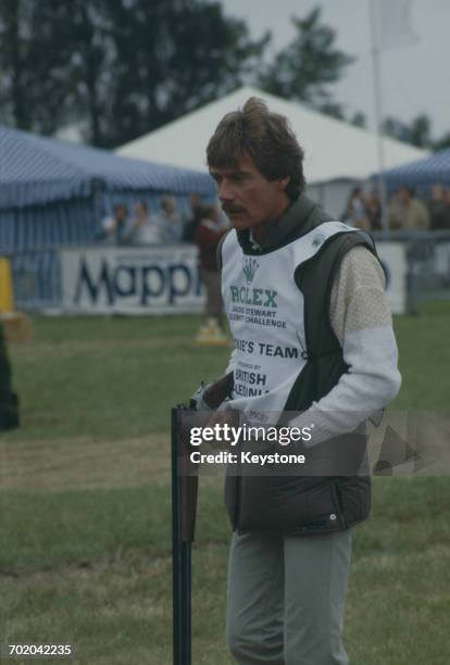 English actor Anthony Andrews at the Jackie Stewart Rolex Celebrity Challenge for clay pigeon shooting in Wales, July 1984.