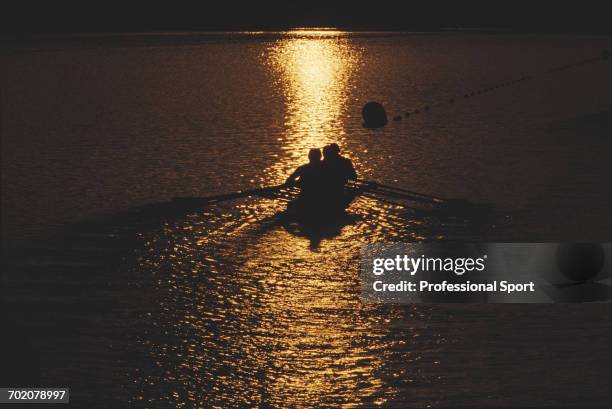 View of a rowing team competing in the quadruple sculls rowing event at the 2000 Summer Olympics at the Sydney International Regatta Centre in...