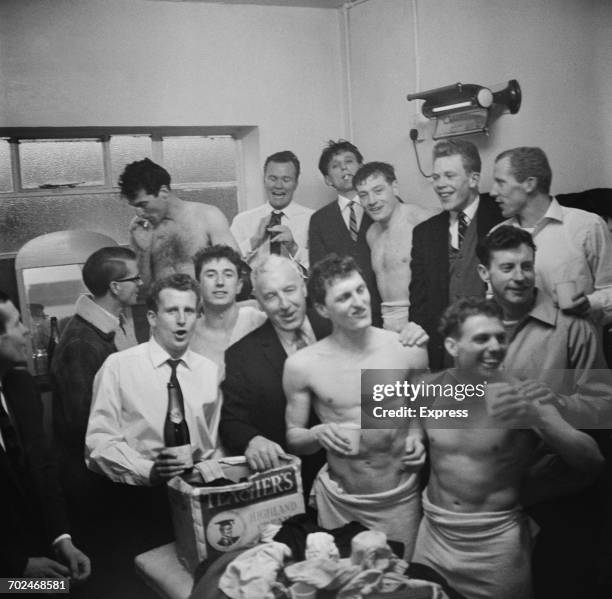 The Oxford United F.C. Team celebrate after a 5th round win against Blackburn Rovers in the FA Cup, 15th February 1964.