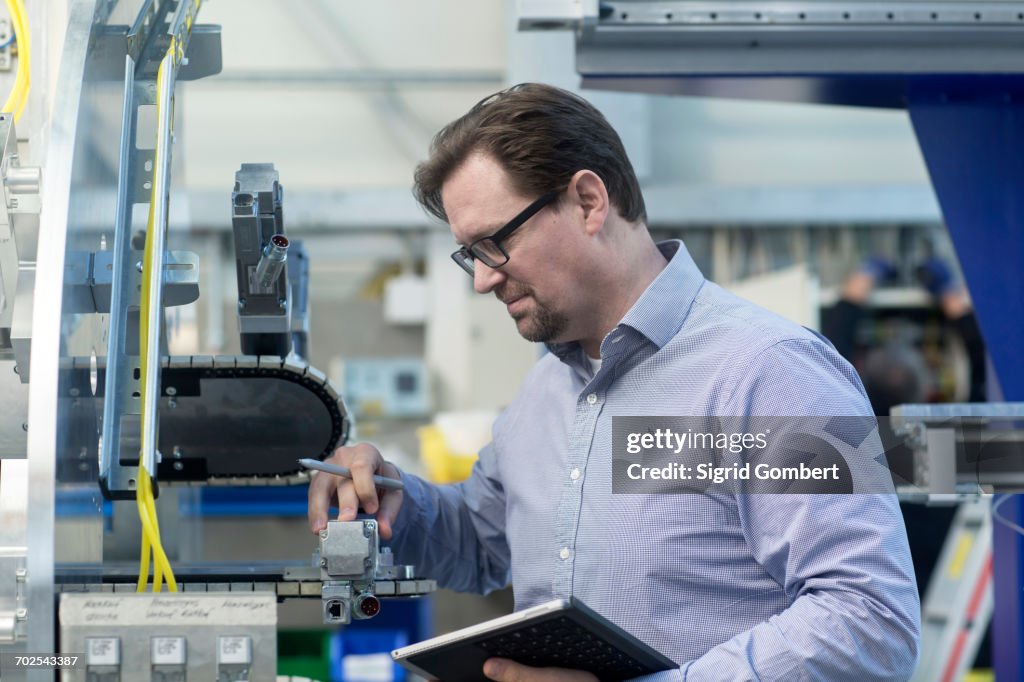 Engineer working in industrial plant