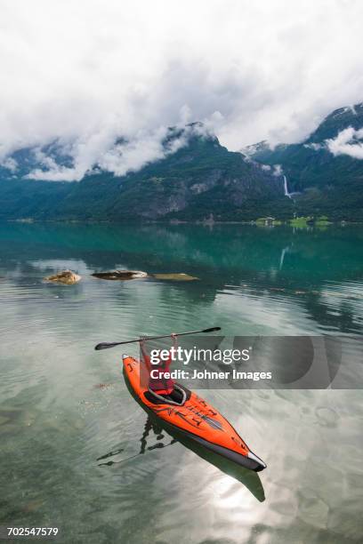 woman sea kayaking - life jacket stock pictures, royalty-free photos & images