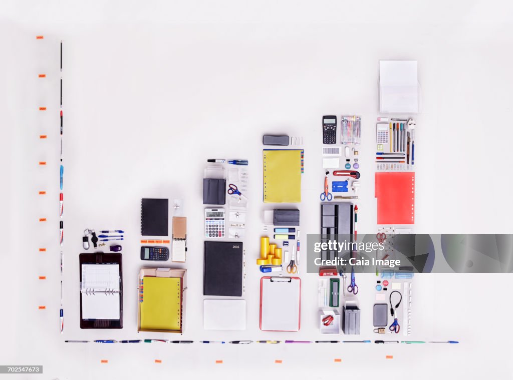 Still life concept office supplies forming bar chart