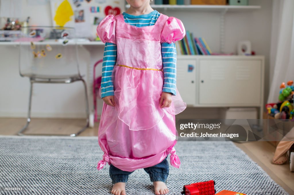 Girl wearing fancy pink dress