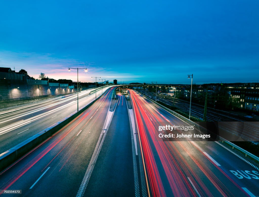 Road traffic at dusk