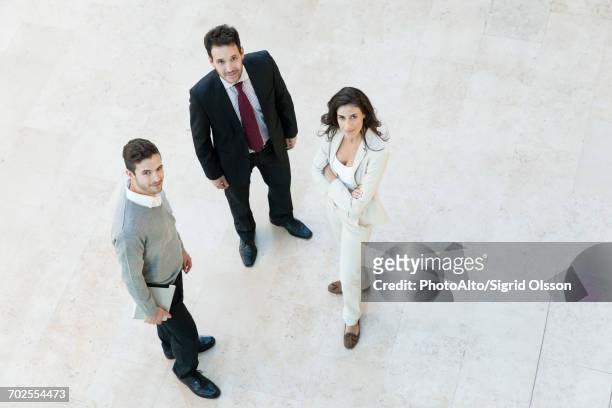 business professionals, portrait - 3 men looking up stock pictures, royalty-free photos & images