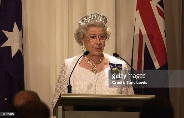 Britains Queen Elizabeth II speaks at a dinner hosted by the Prime Minister of Australia John Howard on the first day of her visit February 27, 2002...