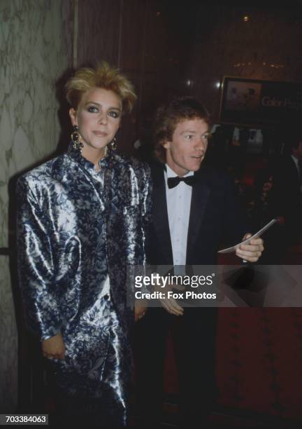 Actress Leslie Ash and comedian Jim Davidson at the premiere of the film 'The Color Purple', London, UK, 11th July 1986.