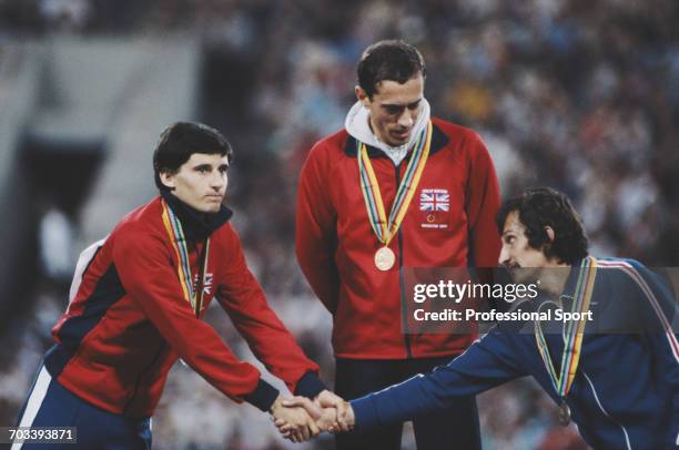 Left to right; silver medal winner Sebastian Coe of Great Britain, gold medal winner Steve Ovett of Great Britain and bronze medal winner Nikolay...