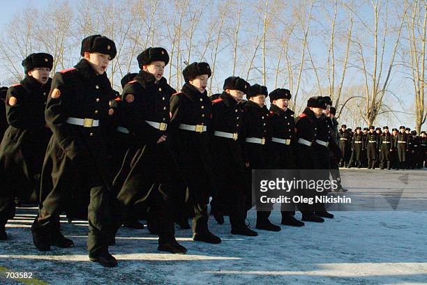Young cadets participate in drills at Krasnoyarsk military school February 21, 2002 in Krasnoyarsk, East Siberia, Russia. Some 600 cadets attend the...
