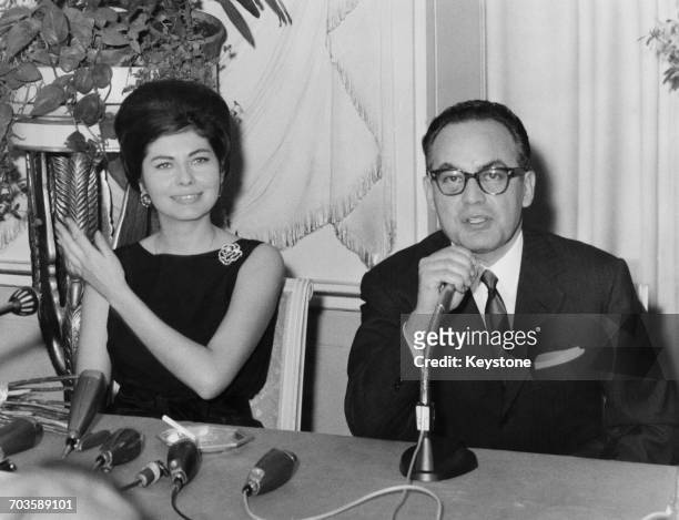 Italian film producer Dino De Laurentiis with Soraya, Princess of Iran at a press conference to announce her signing as an actress, Rome, 18th March...