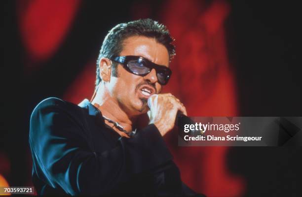 British singer-songwriter George Michael performing at a benefit concert for the NetAid anti-poverty charity, Wembley Stadium, London, 15th June 1999.