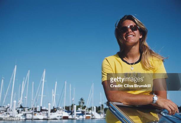 Amelie Mauresmo of France poses for a portrait driving a power speedboat off the coast of Miami during the ATP Lipton Tennis Championship on 10 March...