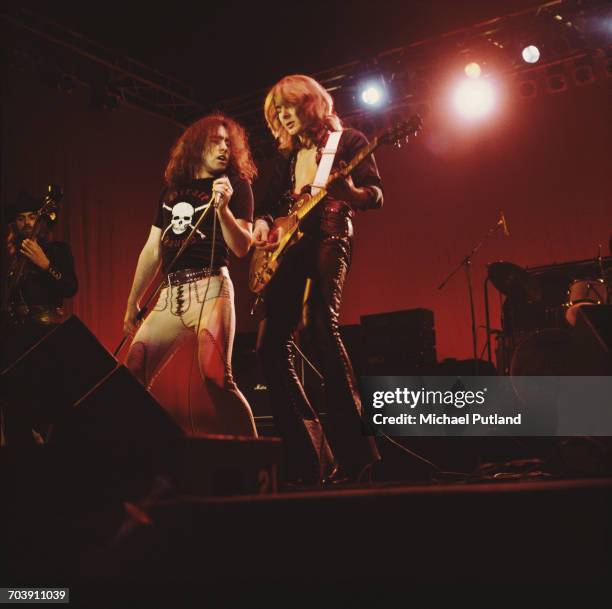 Paul Rodgers and Mick Ralphs performing with rock group Bad Company at The Great British Music Festival, Olympia, London, 2nd January 1976.