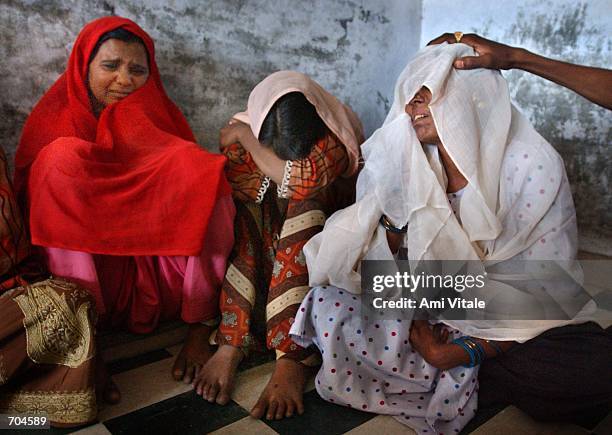 Shaikh Kulsumbibi Shaikh Samimbanu and Shaikh Badarubibi muslims whose family was gruesomly murdered and their village of Sardarpur destroyed in an...