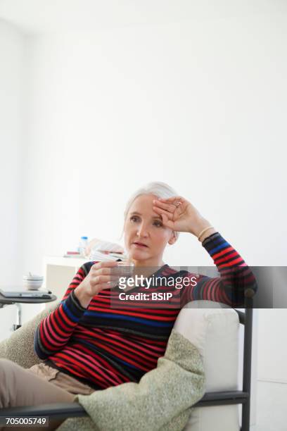 woman with hot flush - hot flash stock pictures, royalty-free photos & images