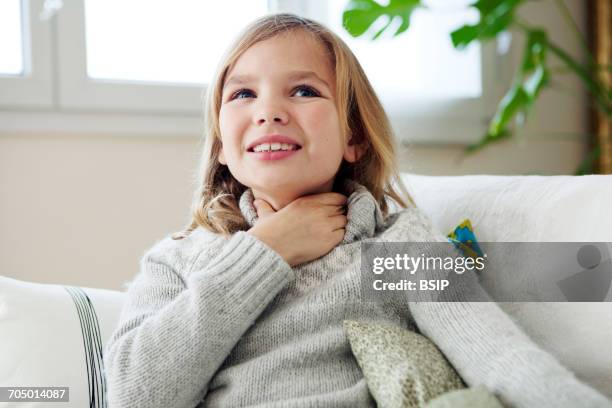 child with sore throat - throat stock pictures, royalty-free photos & images