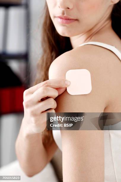 contraception, patch - contraceptive patch stock pictures, royalty-free photos & images