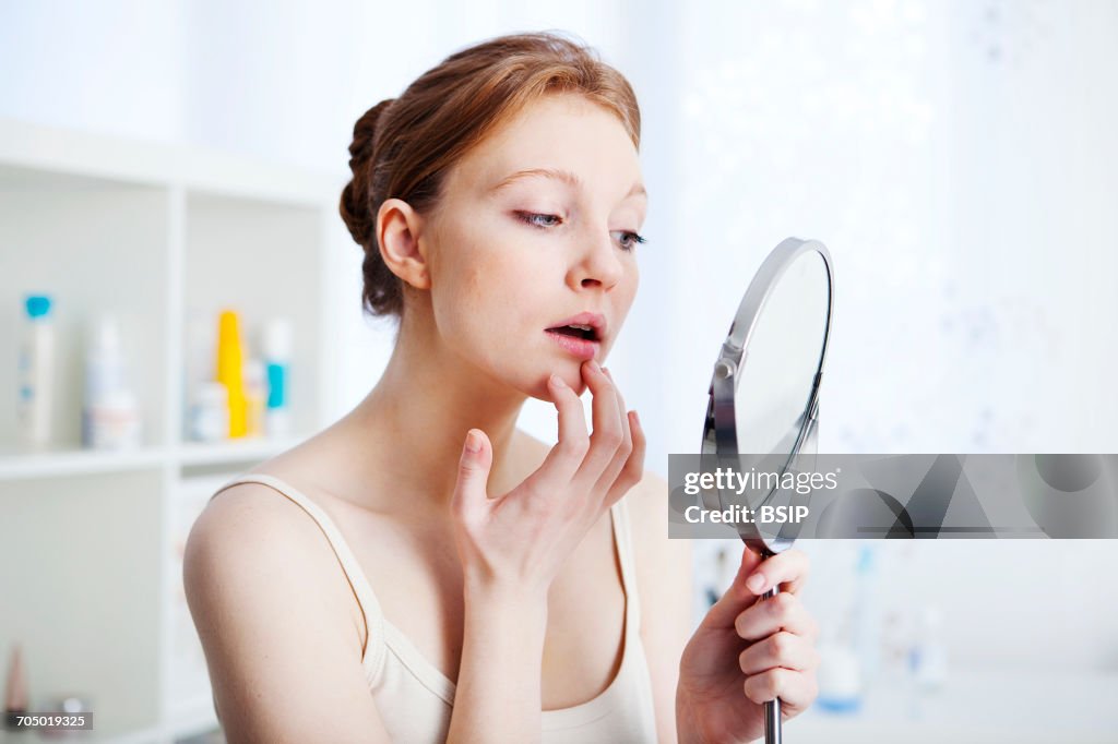 Woman with mirror