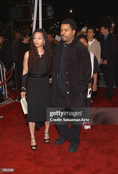 Actor/rapper Ice Cube arrives with his wife at the premiere of the movie "All About The Benjamins" March 6, 2002 in Los Angeles, CA.