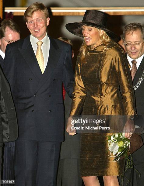 Dutch Crown Prince Willem Alexander and Princess Maxima leave the Dutch East Indies Companys 400th anniversary celebration March 20, 2002 in The...