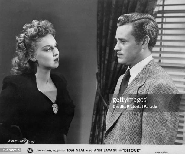Ann Savage as Vera, and Tom Neal as Al Roberts in a publicity still for Edgar G. Ulmer's film noir, 'Detour', 1945.
