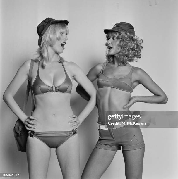 Models Nancy Lee and Tiiu Leek wearing bikinis, UK, 12th October 1971.