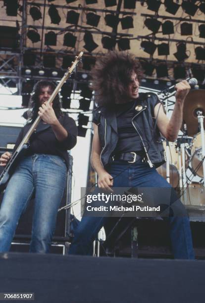 Vocalist Paul Mario Day and bass guitarist Brian Day of heavy metal group More perform live on stage at the Monsters of Rock festival at Donington...