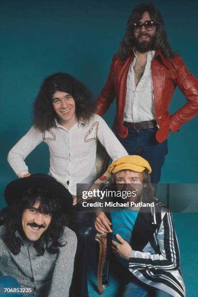 Scottish rock group Nazareth posed in London circa 1974. Clockwise, from bottom left: guitarist Manny Charlton, singer Dan McCafferty, drummer...