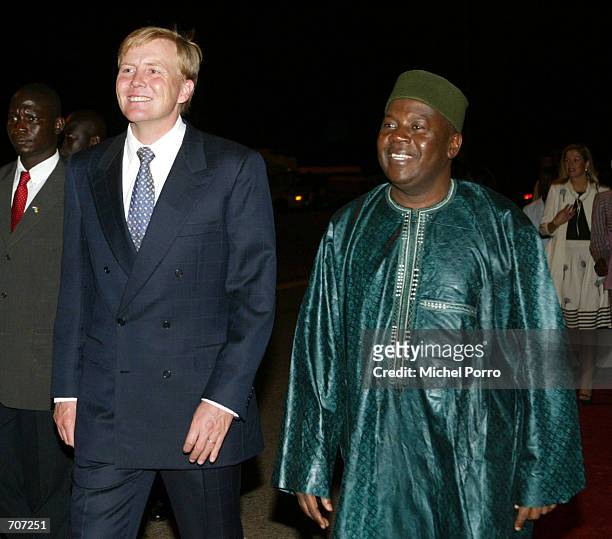 Dutch Crown Prince Willem Alexander walks with Ghanian Vice President Alhaji Aliu Mahama at Kotoka Airport April 14, 2002 in Accra, Ghana. The prince...