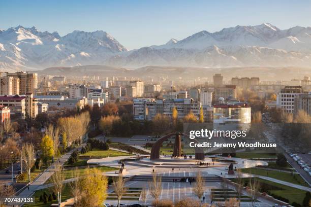 victory square near kyrgyz range, bishkek, frunze, kyrgyzstan - bishkek stock pictures, royalty-free photos & images