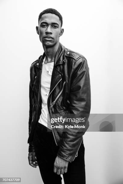 portrait of serious black man wearing leather jacket - black and white portrait man stock pictures, royalty-free photos & images