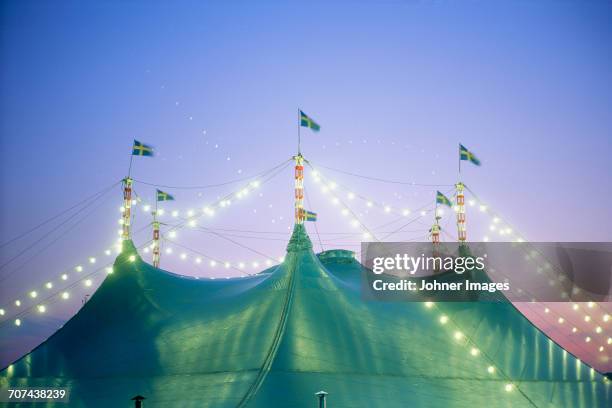 tent with flags - carpa de circo fotografías e imágenes de stock