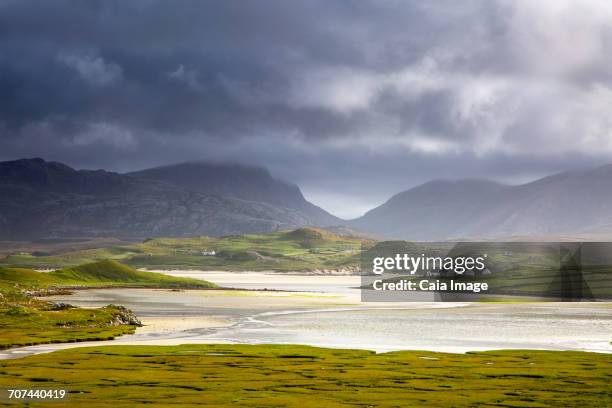 tranquil view of mountains and water, uig, isle of lewis, outer hebrides - isle of lewis stock pictures, royalty-free photos & images