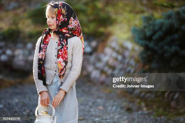 girl dressed up as easter witch - national day in sweden 2017 stockfoto's en -beelden