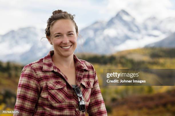 portrait of woman hiking in mountains - colorado hiking stock pictures, royalty-free photos & images