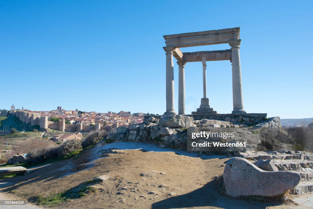 Spain, Avila, view to the city with fortified wall around and archeological site in the foreground