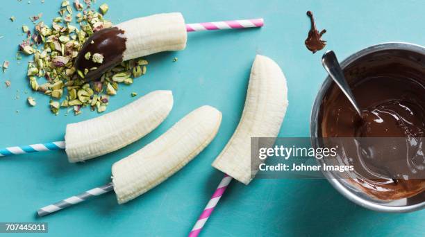 banana and chocolate dessert - lollipops stock pictures, royalty-free photos & images