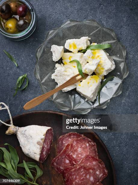 feta cheese, salami and olives - dragon stockfoto's en -beelden