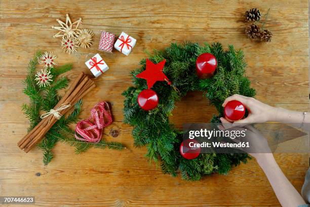 preparing of an advent wreath - christmas advent wreath stock pictures, royalty-free photos & images