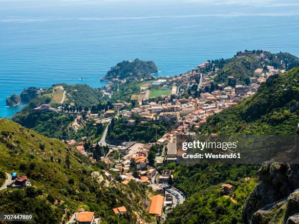 italy, sicily, castelmola, view above taormina to the bay of giardini naxos - giardini naxos stock pictures, royalty-free photos & images