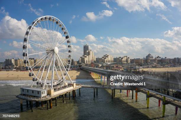 netherlands, the hague, scheveningen, ferris wheel, pier, beach and spa hotel - scheveningen stock pictures, royalty-free photos & images