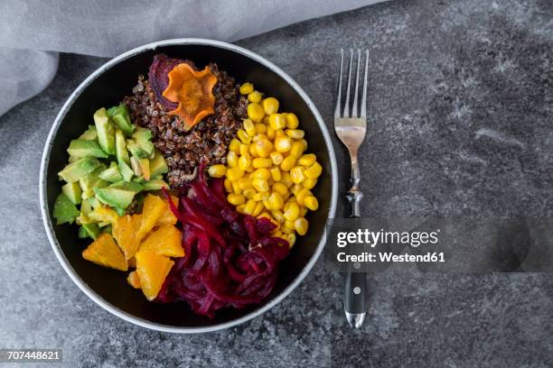 lunch bowl of red quinoa, beetroot, corn, avocado, orange and vegetable chips - vegetable chips stock pictures, royalty-free photos & images
