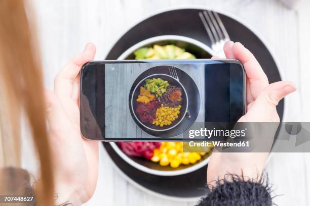 girl taking a photo of lunch bowl with her smartphone, close-up - vegetable chips stock pictures, royalty-free photos & images