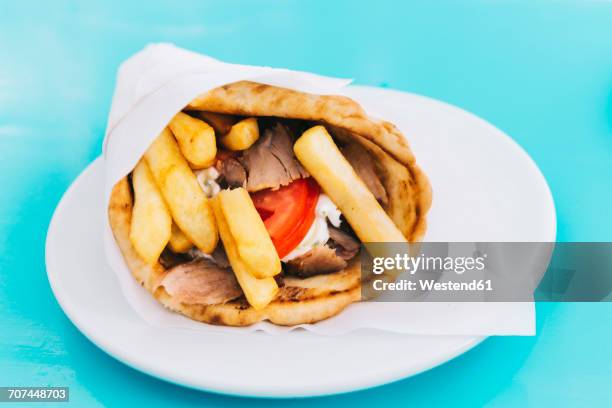 greece, pita bread with chicken souvlaki, french fries and tzatziki - souvlaki stock pictures, royalty-free photos & images